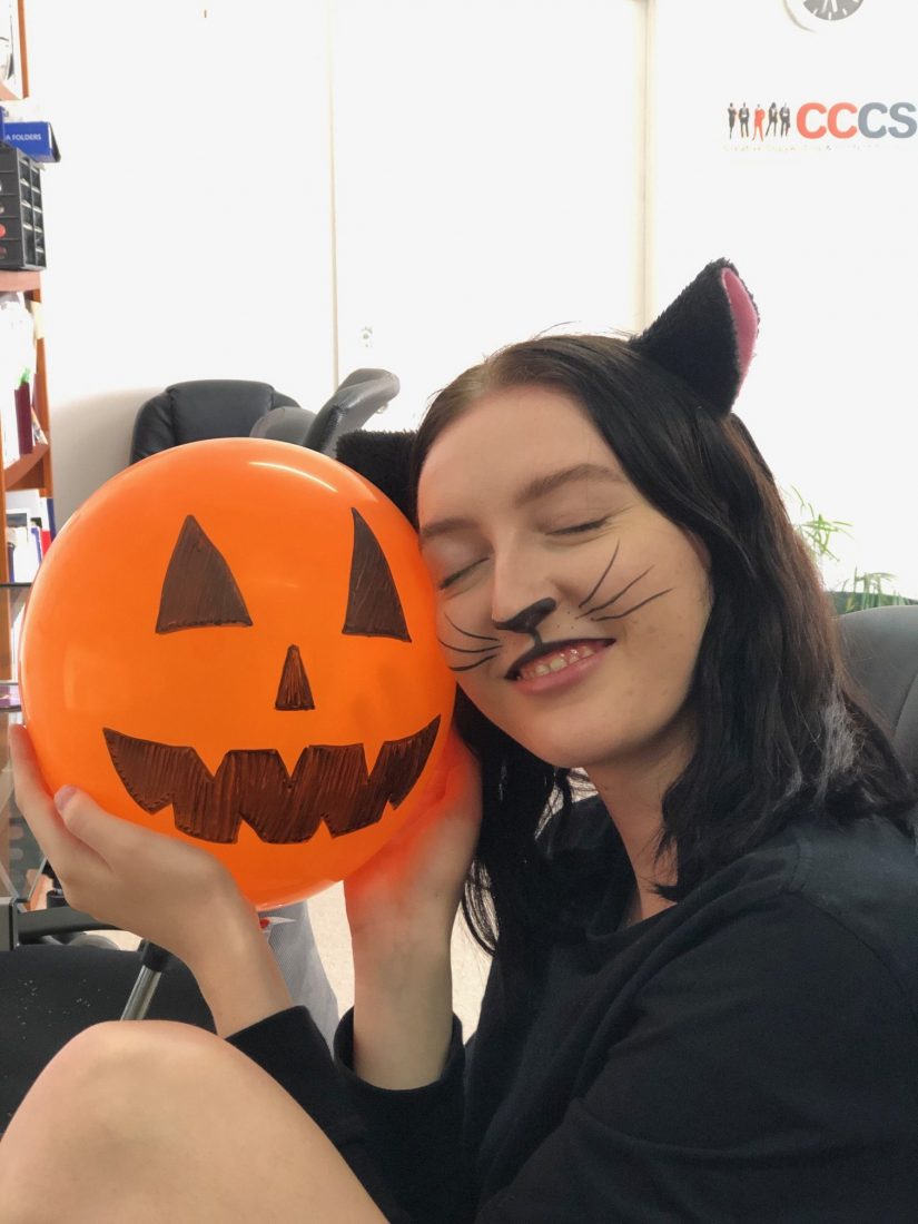 Image of Jessie with halloween balloon Creative Copywriting